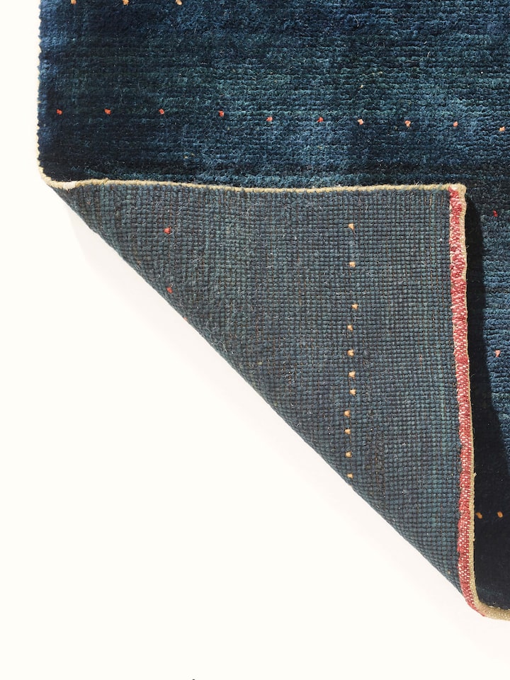 Overall view of the Traditional Gabbeh blue Jaipur wool hand-knotted carpet, showcasing its size and style.
