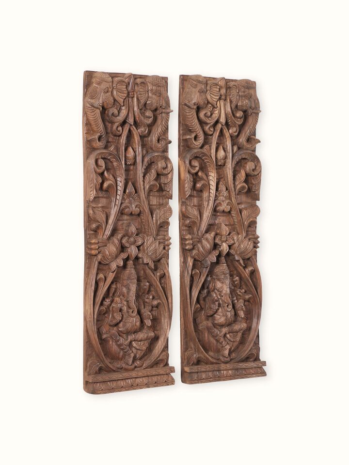 Angled view of the Wood Carved Ganesha Wall Panel (2 Pieces)
