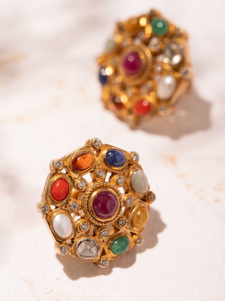 Styled detail view of Navratna Silver Studs displayed, shown in another styled shot