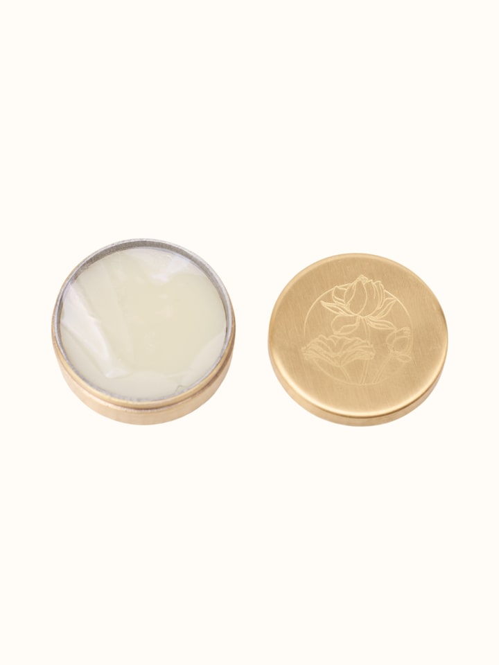 Detail view of Solid Perfume Madhu highlighting the packaging label detail