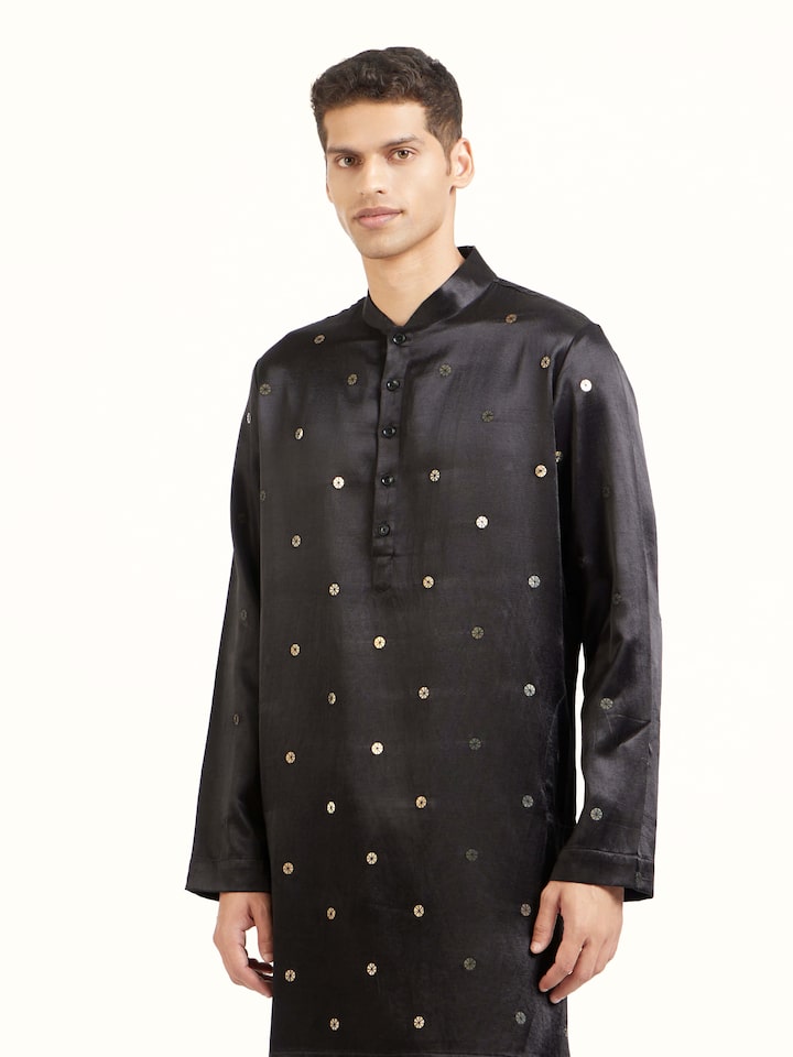 Angled view of black hand embroidery long kurta highlighting embroidery craftsmanship