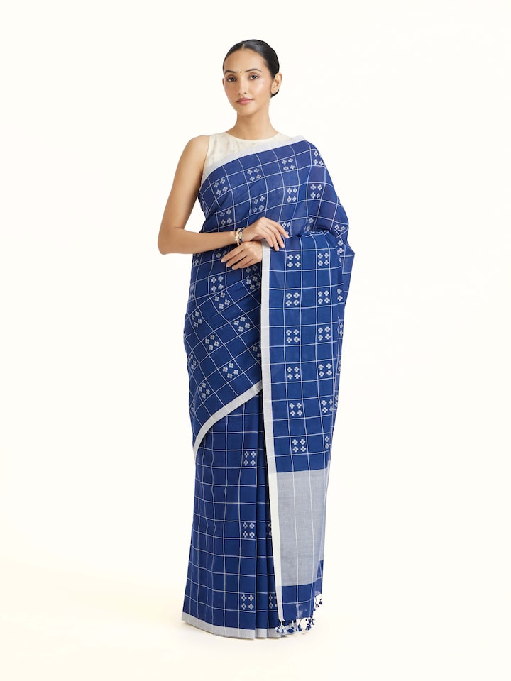 Front view of Blue Muslin Jamdani Saree showcasing its traditional craftsmanship and design