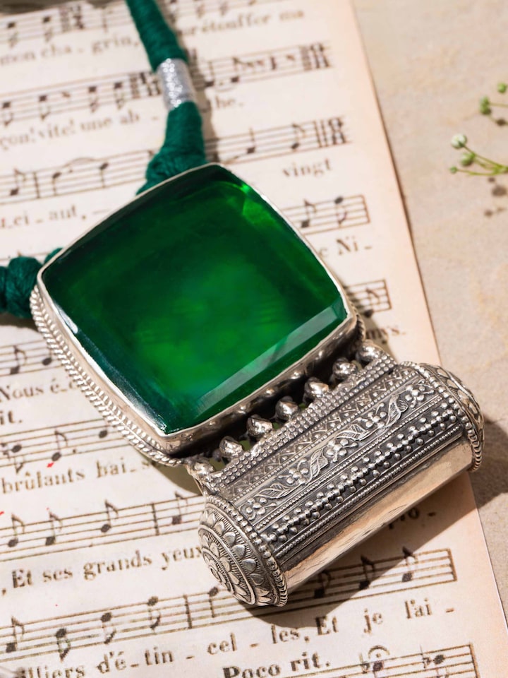 Detail view of Silver Smithing Collar Necklace highlighting the stone setting and metalwork detail