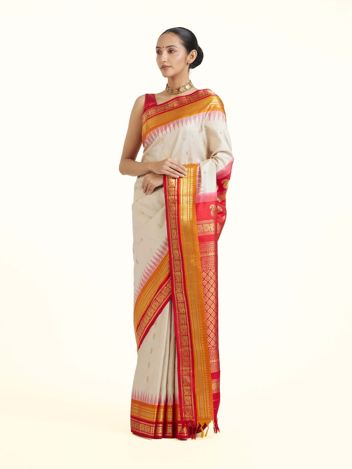 Side view of Cream Gadwal Silk Zari Saree highlighting the detailed craftsmanship and elegant silhouette