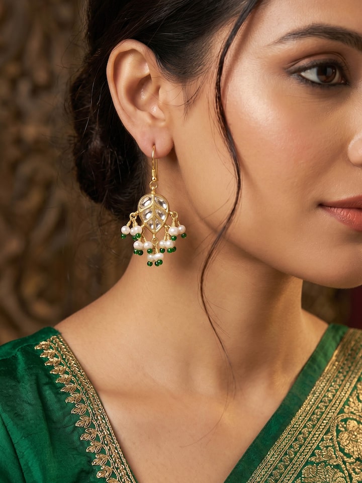 Styled view of Jadau 18 Karat Gold Drop Earrings worn on the ear, showing how it looks styled