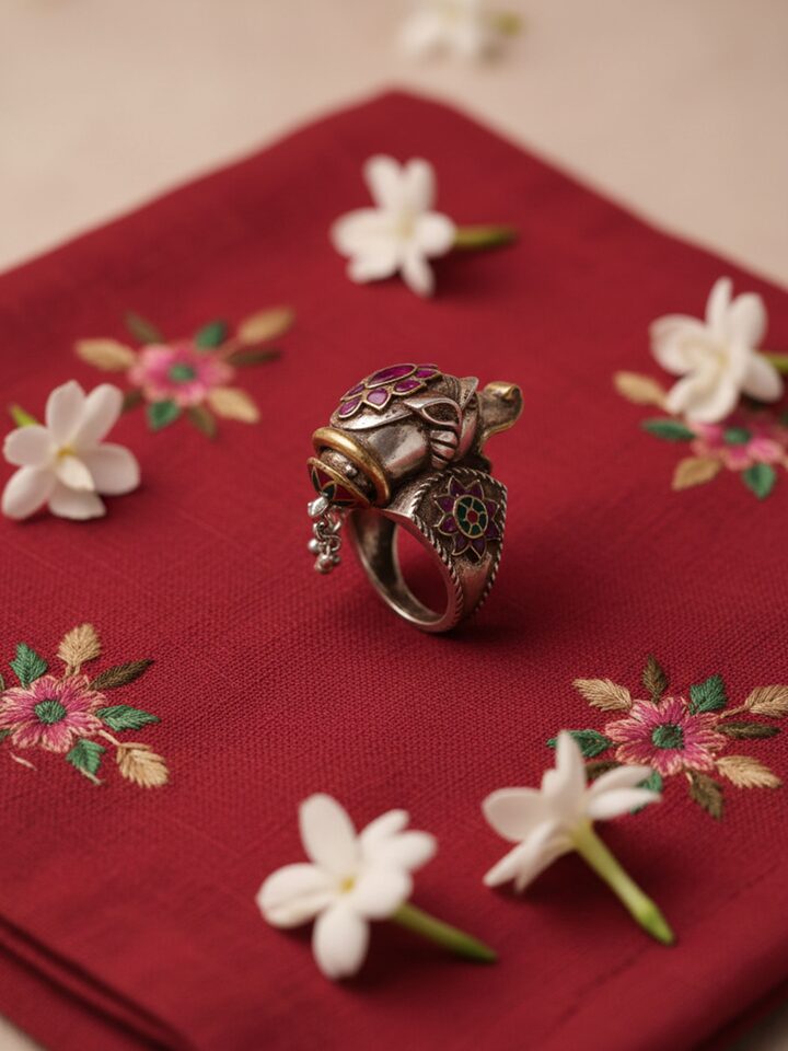 Styled view of Silver Smithing Ring worn on the finger, showing how it looks styled, from a different angle