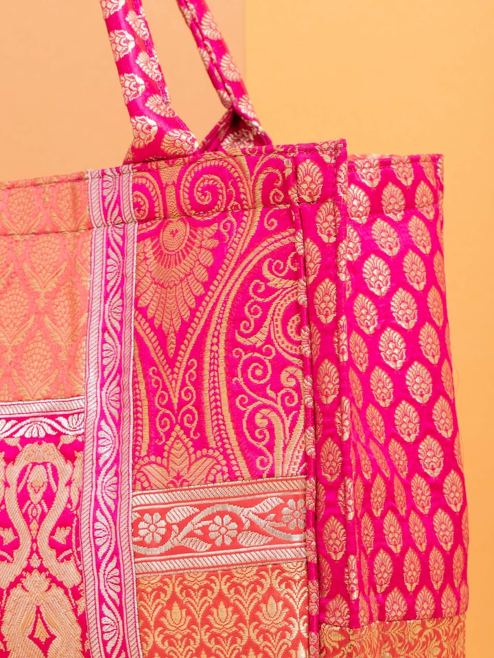 Side view of Brocade Patchwork Tote Bag focusing on the intricate patterns and craftsmanship