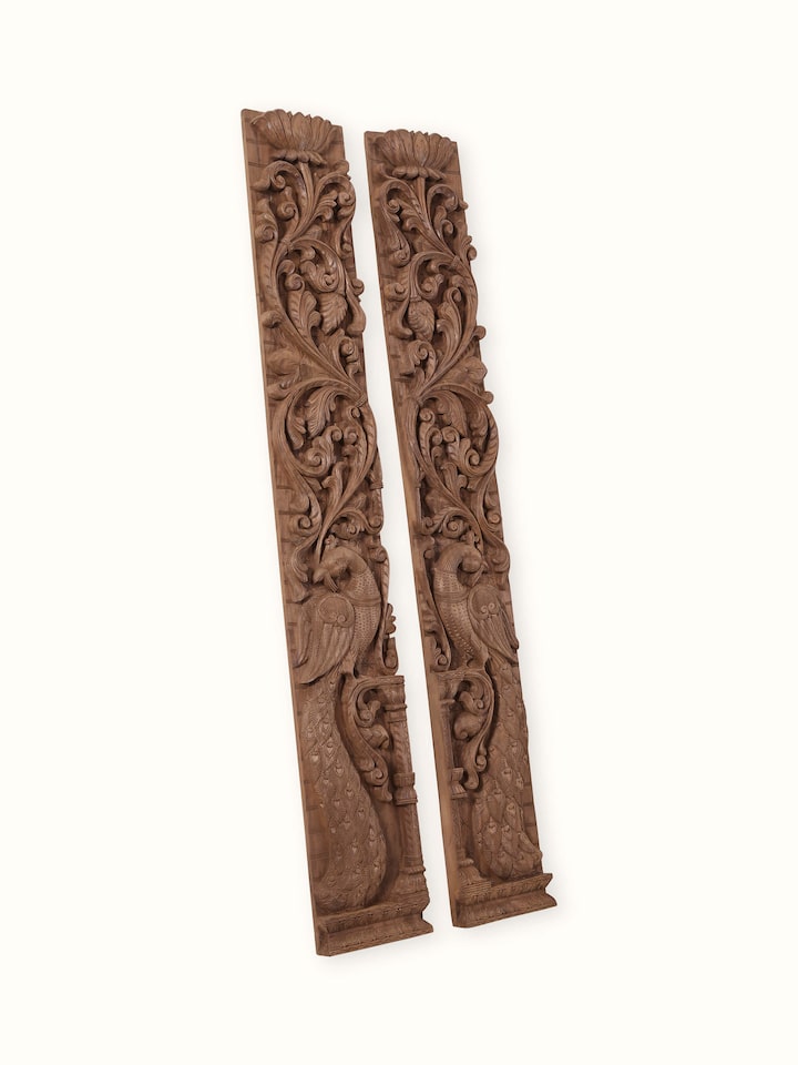 Angled view of the Wood Carved Peacock Panels (2 Pieces)