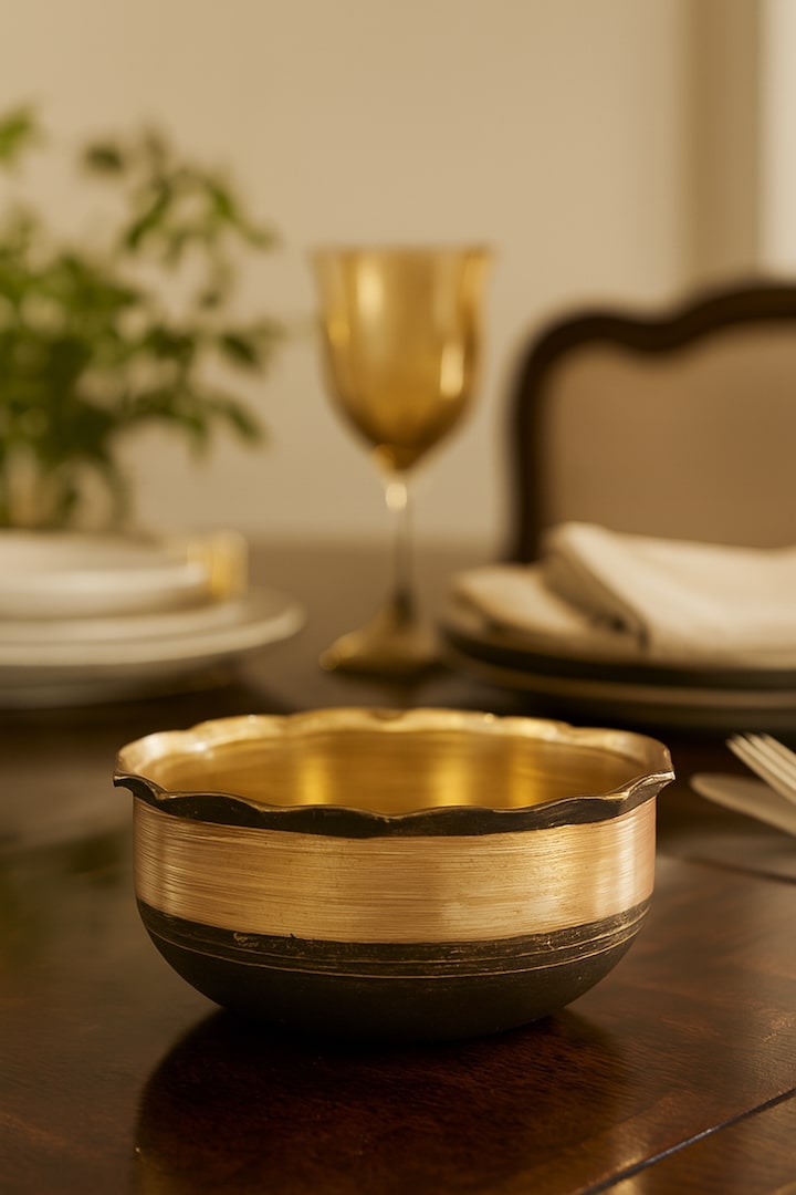 Lifestyle view of Bell Metal Pinchha Dinner Bowl
