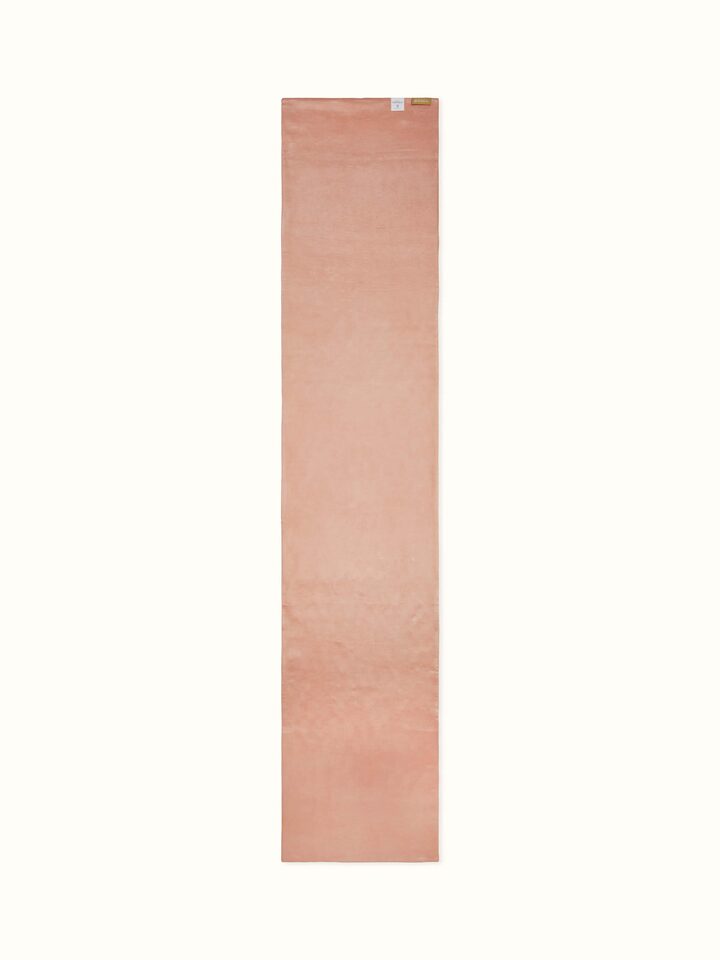 Back view of peach bed runner with finished hemline and subtle sheen.