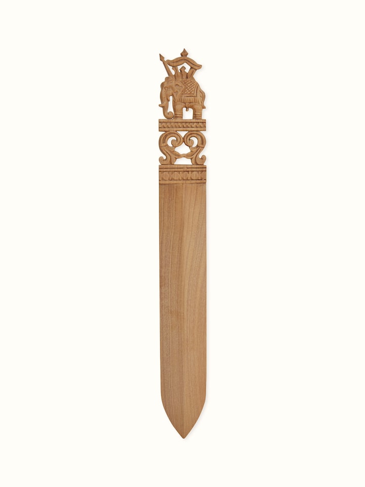 Detailed view of Carved Sandalwood Paper Cutter from Swadesh showcasing its elegant design and fine quality wood