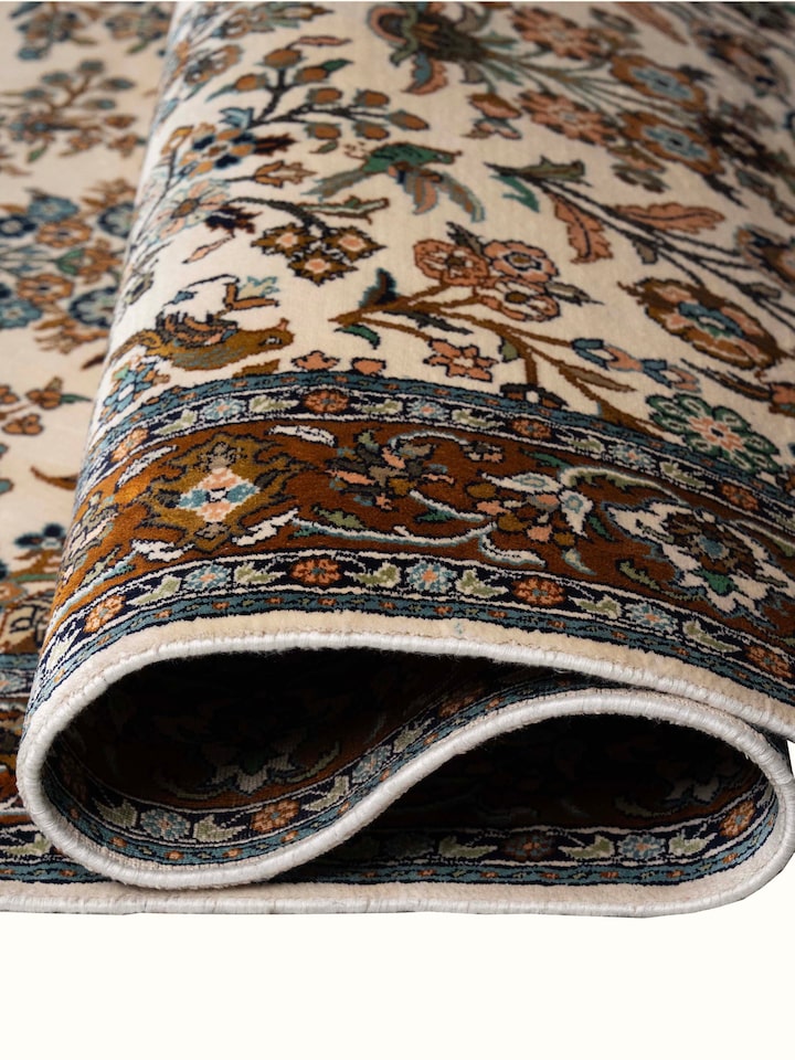 Detail view of Traditional Persian Ivory Mahal Kashmir Silk Hand-Knotted Carpet highlighting the intricate pattern and pile texture, from a differe...