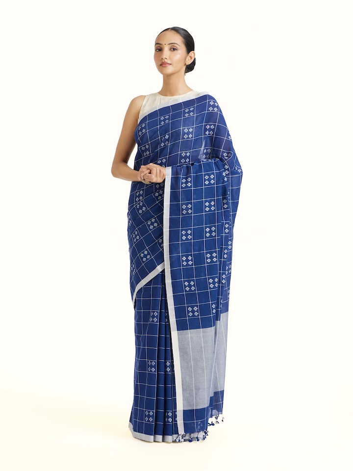 Side view of Blue Muslin Jamdani Saree highlighting the detailed craftsmanship and elegant silhouette