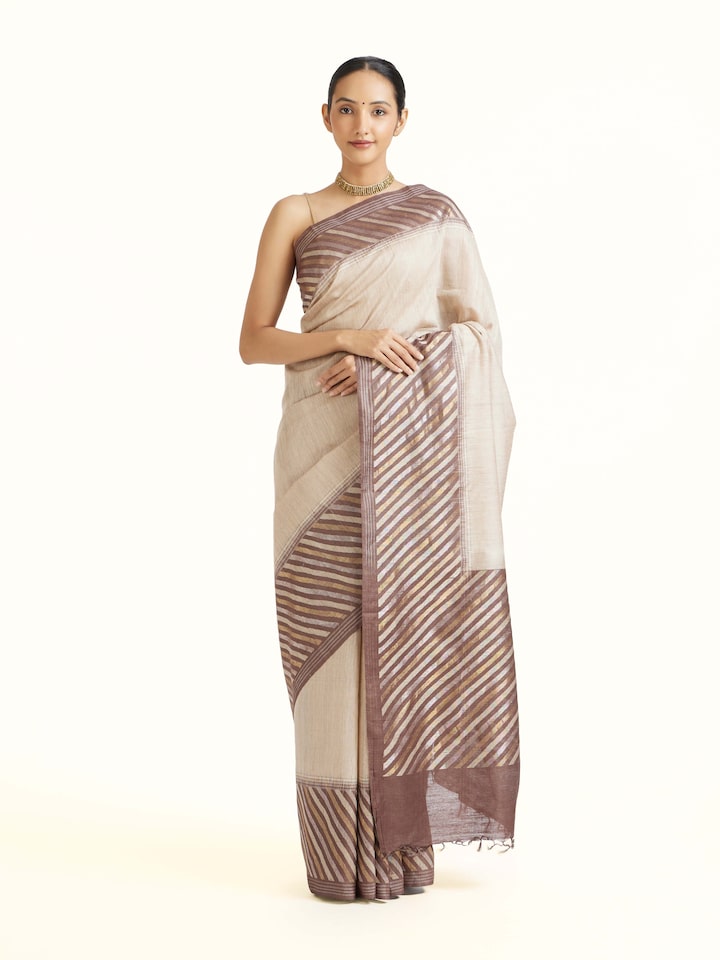Front view of the Beige Tussar Muga Silk Saree