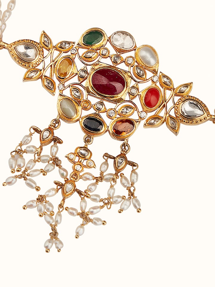 Side view of Navratna silver choker emphasizing its elegant design and detailed gemstone arrangement