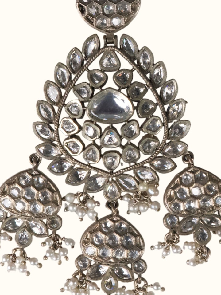 detail view of dank polki silver drop earrings design