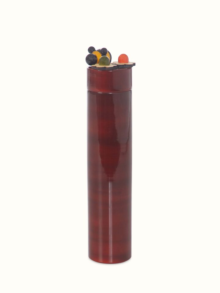 Front view of Channapatna Ivory Wood Sketch Kase in Red highlighting traditional craftsmanship