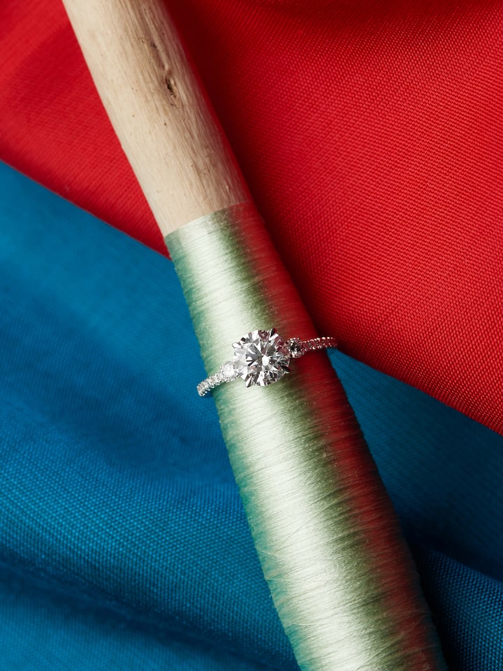 lifestyle view of open setting 14 karat gold ring