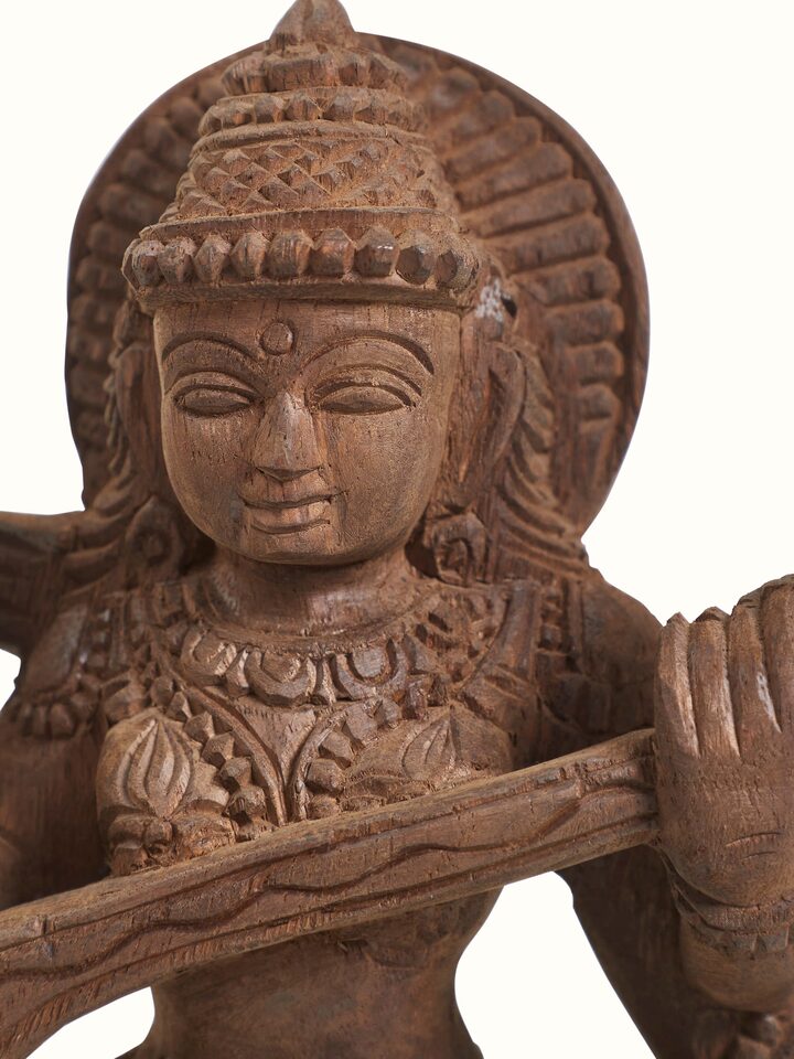 Detail view of the Wood Carved Saraswati Devi Idol