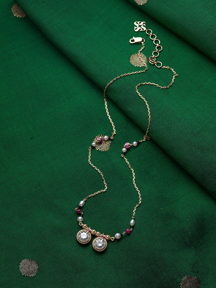 lifestyle view of open setting 14 karat gold mangalsutra