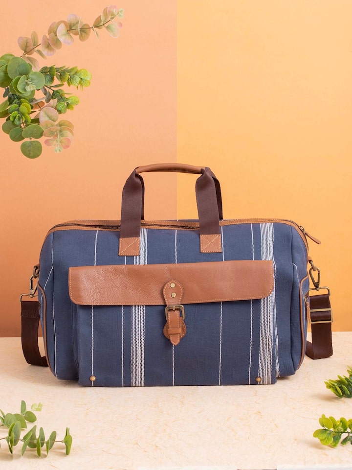 Side view of Blue Handloom Cotton Duffle Bag highlighting the detailed design and fabric quality