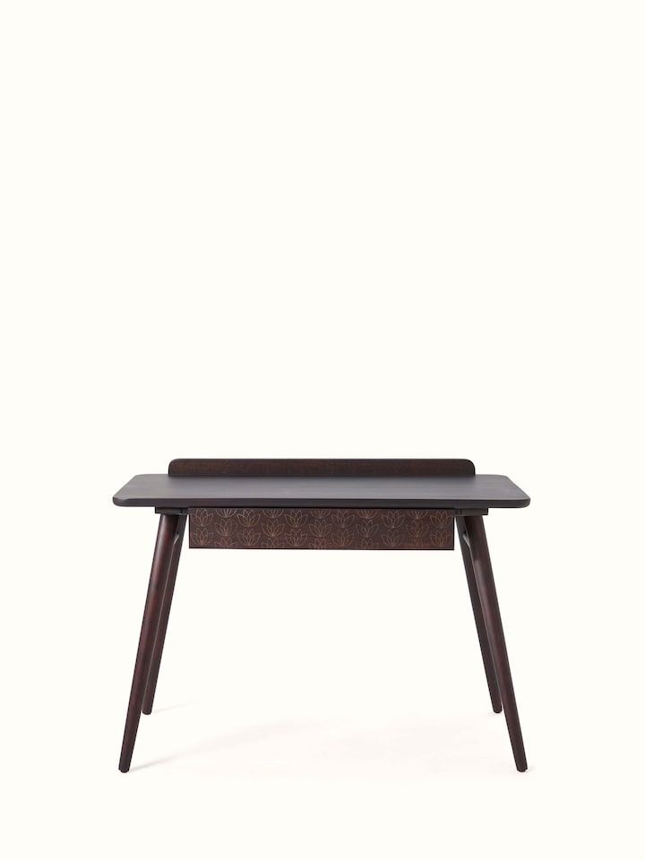 Front view of Sheesham wood study table with intricate brass tarkashi inlay, showcasing the elegant design and detailed craftsmanship