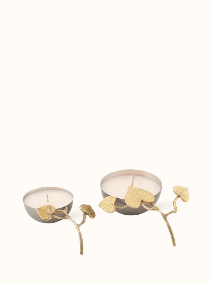 Front view of Neroli brass candles (set of 2) displaying their elegant design and polished finish.