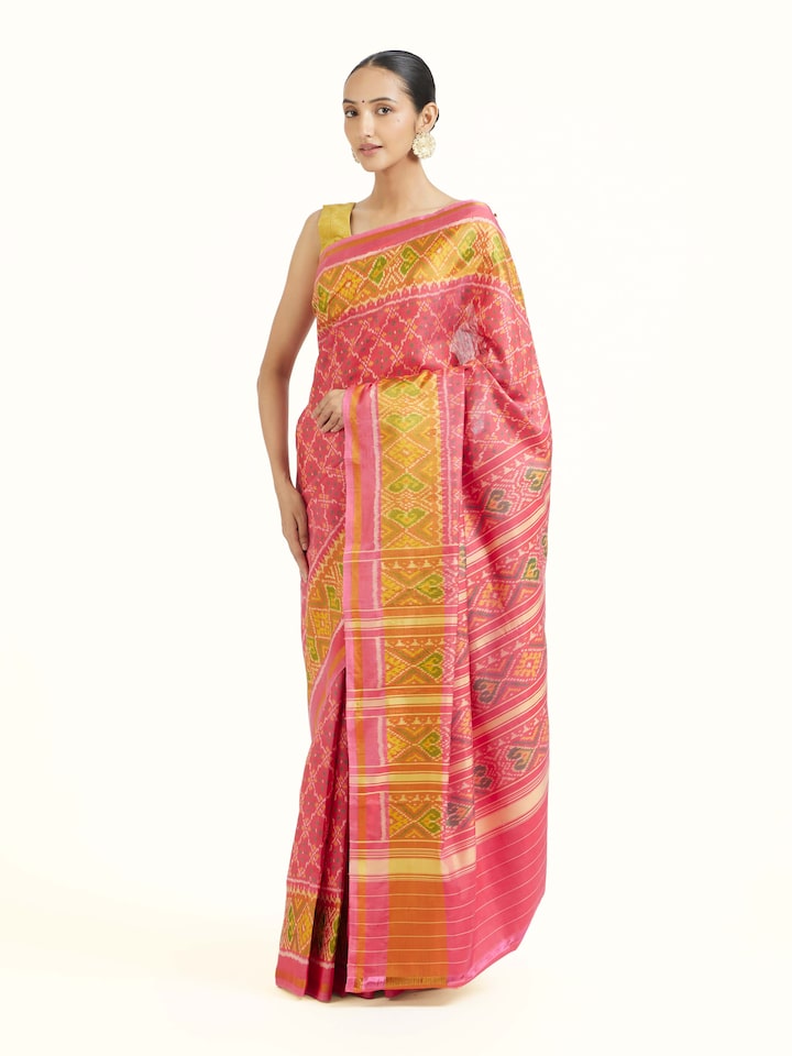 Side view of Rajkot Patola Ikat Saree highlighting the detailed craftsmanship and elegant silhouette
