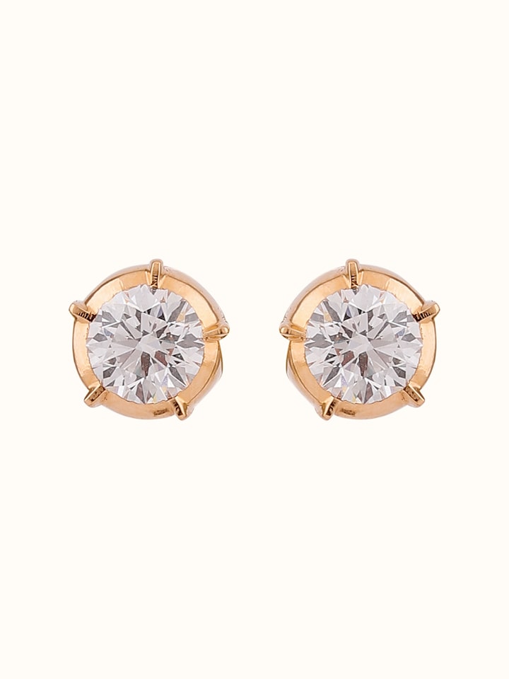 Front view showing polished gold surface and classic stud design