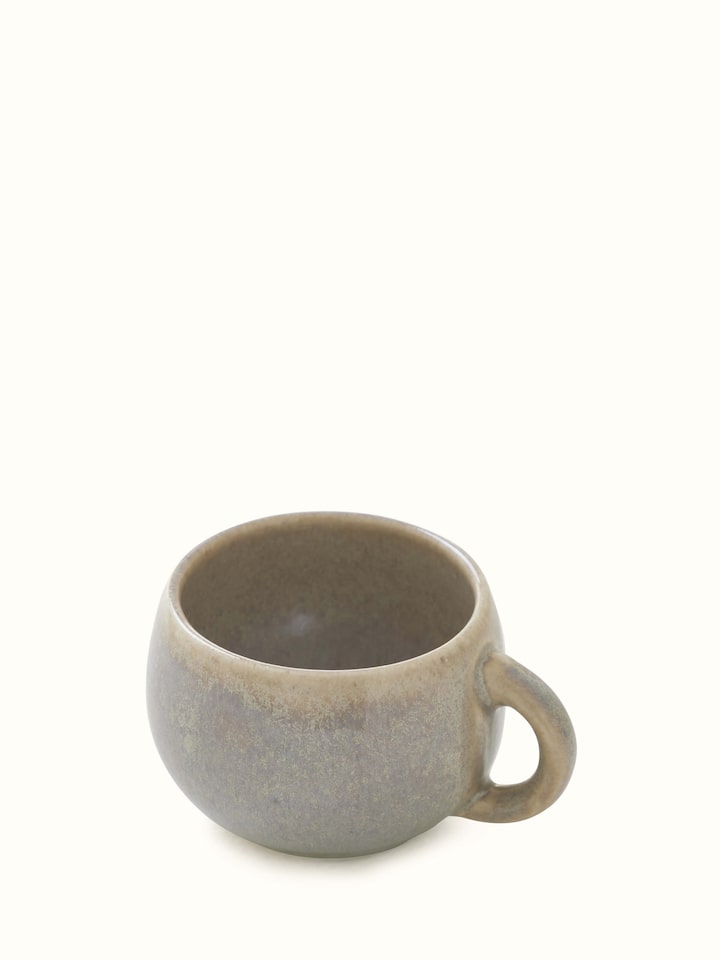 Detailed view of Khurja Pottery Stoneware Condiment Container Set highlighting the texture and color of the pottery.