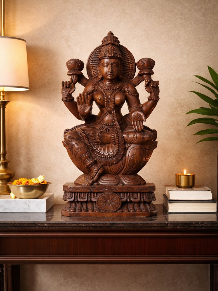 Side view of the Wood Carved Lakshmi Devi Idol