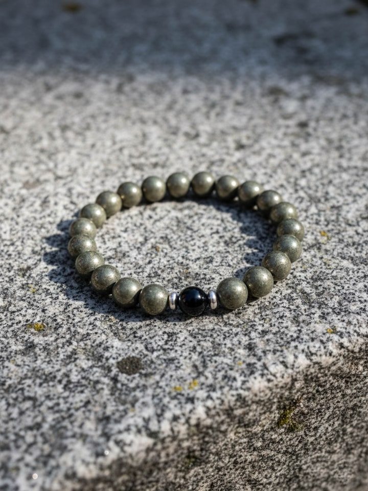Styled view of Gemstone Pyrite & Black Onyx Bead Silver Bracelet styled as worn