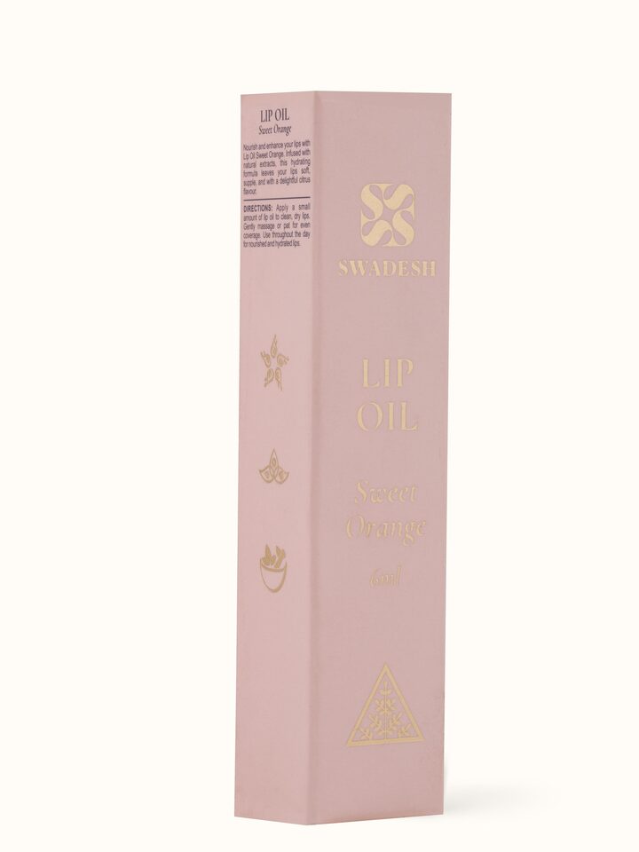 Lip Oil Sweet Orange displayed in a beauty setting, perfect for enhancing lips