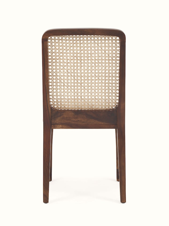 Base view of Sheesham Wood & Cane Dining Chair showcasing the solid construction and elegant wood legs.