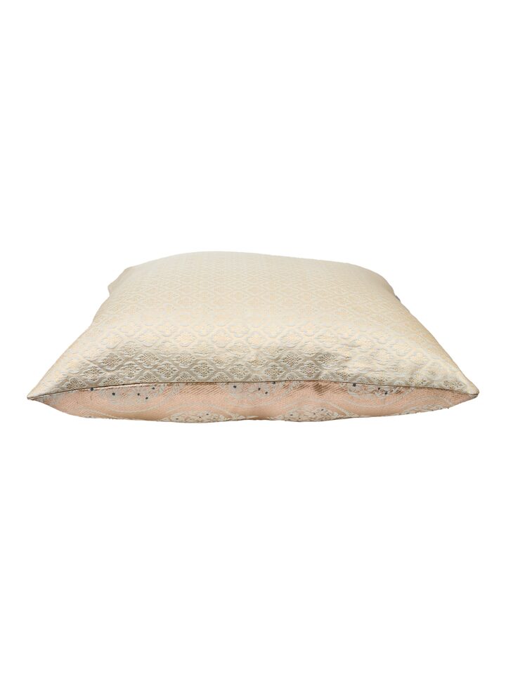 Awadh boota pista Banarasi handloom silk cushion cover, angled view highlighting weave
