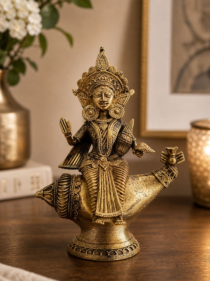 Side view of the Vishnupatni Dhokra Brass Lakshmi on Conch Shell Idol