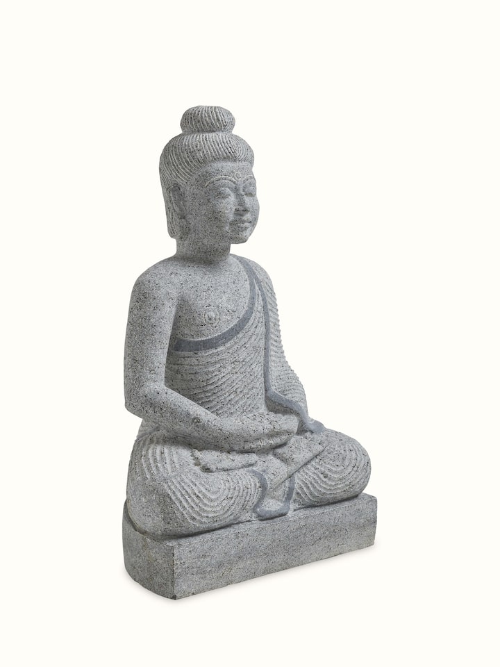 Angled view of Buddha Stone Carving Idol