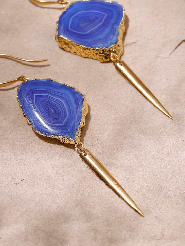Angled view of Agate Drop Earrings displaying their elegant drop and hook design