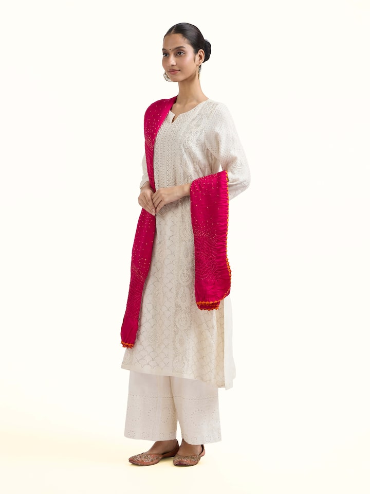 Side view of Pink Bandhani Tie & Dye Dupatta V highlighting the detailed craftsmanship and elegant silhouette