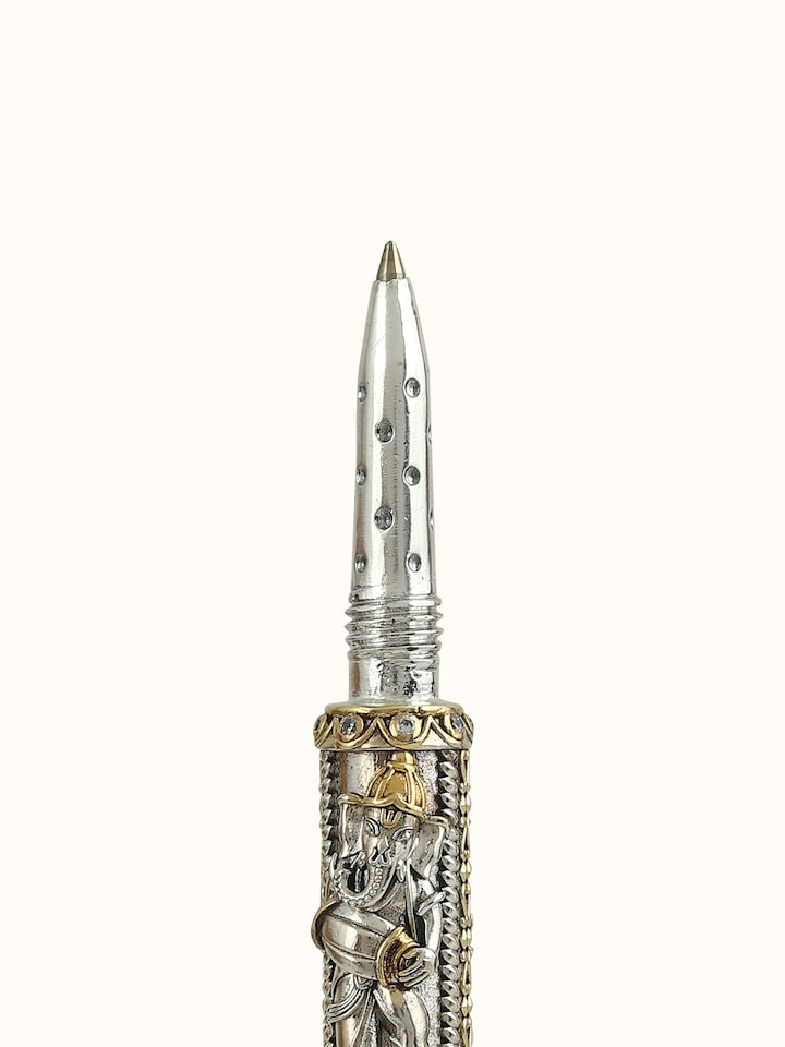 Detail view of Nakash Silver Ganesha Pen highlighting the stone setting and metalwork detail
