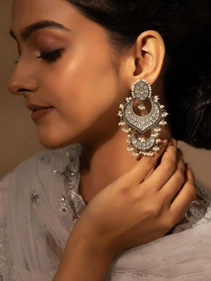 Lifestyle view of Dank Polki silver drop earrings