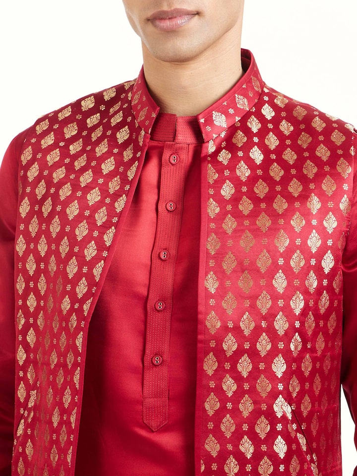 Detail view of maroon silk Banarasi sleeveless jacket showing silk texture and craftsmanship