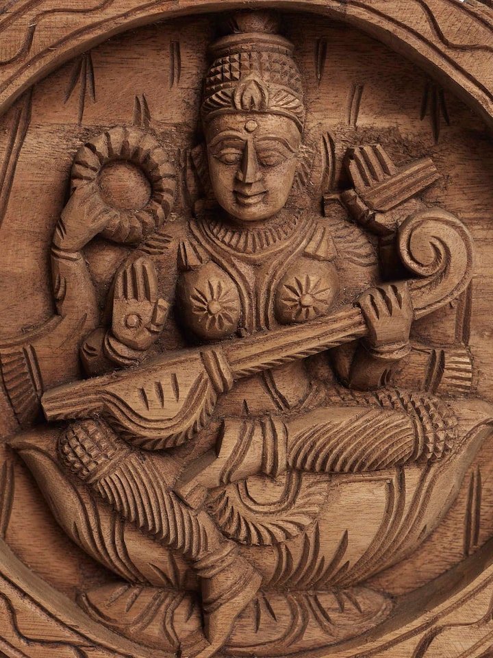 Detailed view of the Wood Carved Saraswati Idol