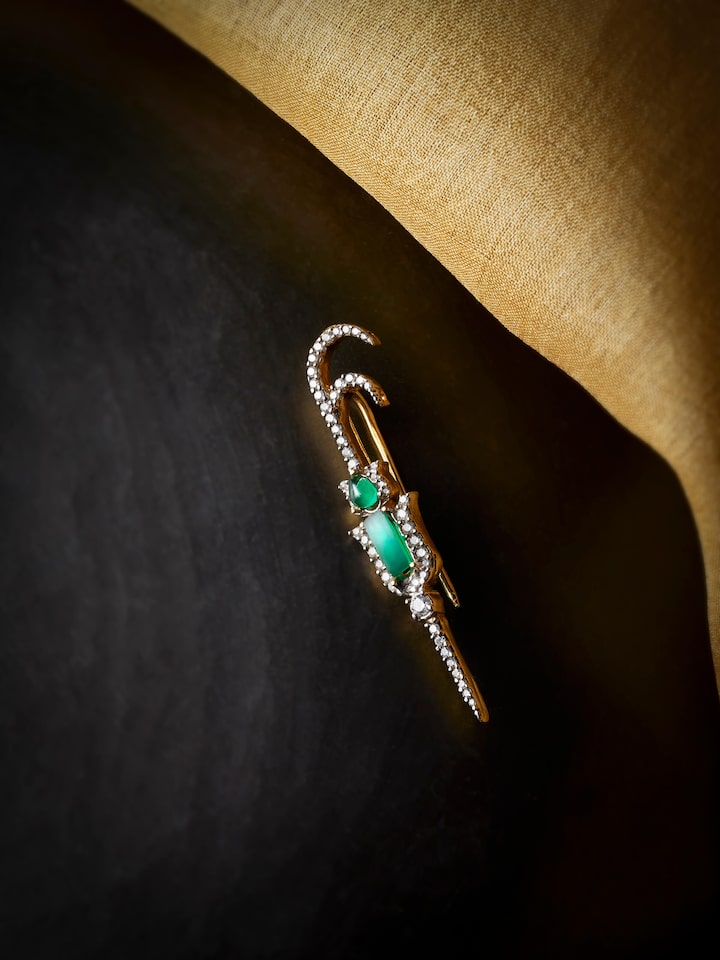 Close-up of the Silver Smithing Yellow Gold Brooch Pin craftsmanship