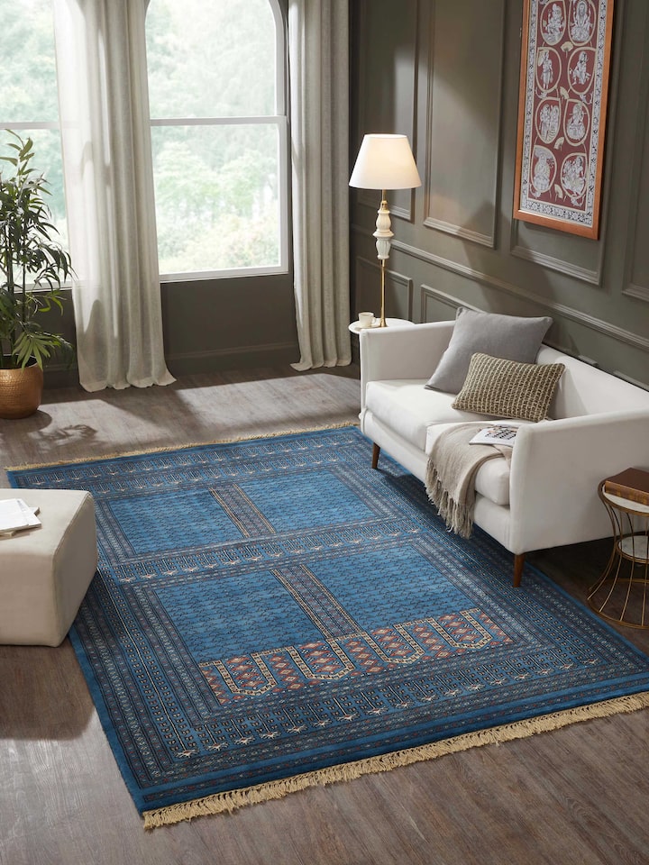 Styled view of Amritsari Parda Blue Gwalior Wool Hand-knotted Rug styled in a room setting