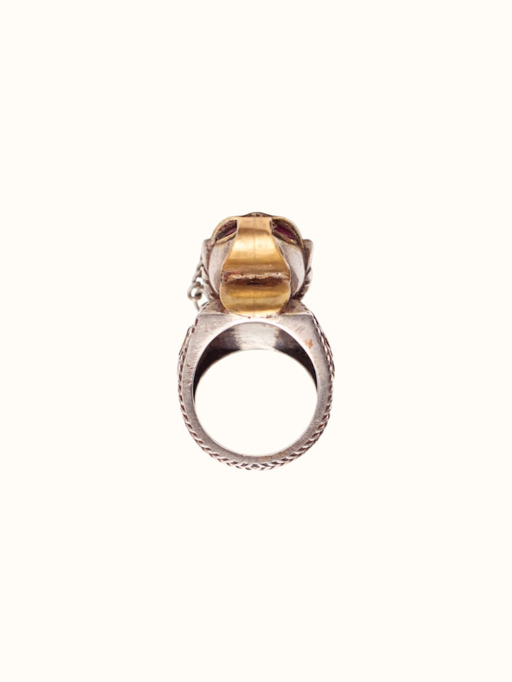 Detail view of Silver Smithing Ring highlighting the stone setting and metalwork detail