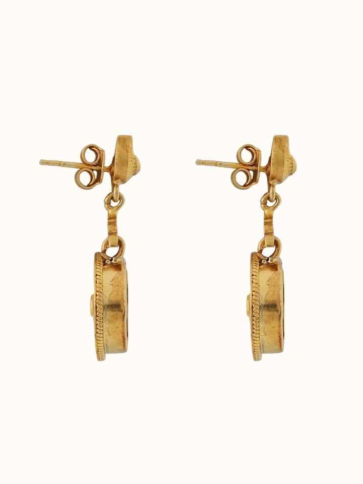 Side view of Thewa Silver Drop Earrings showing the side profile and setting