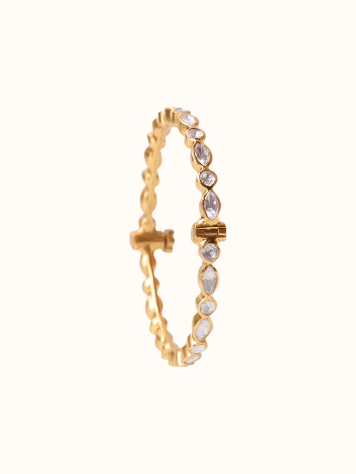 front view of silver smithing gold plated bangle with polished finish