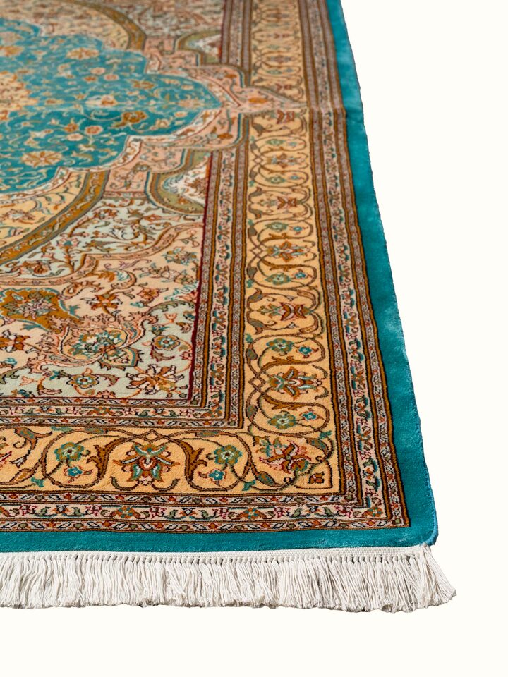 Close-up view of Traditional Persian Blue Tabriz Kashmir Silk Hand-Knotted Carpet highlighting the hand-knotted weave and motif detail