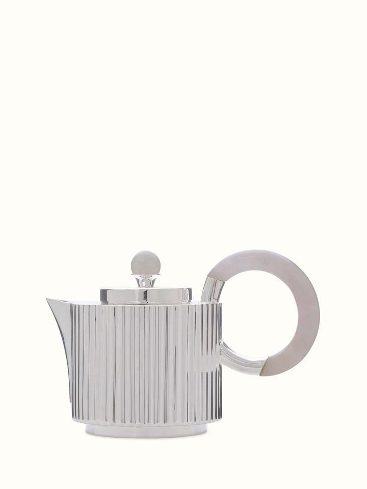 Close-up view of Silver Water Reed Tea Set (3 Pcs), emphasizing the detailed water reed craftsmanship and reflective silver finish of the tea set.